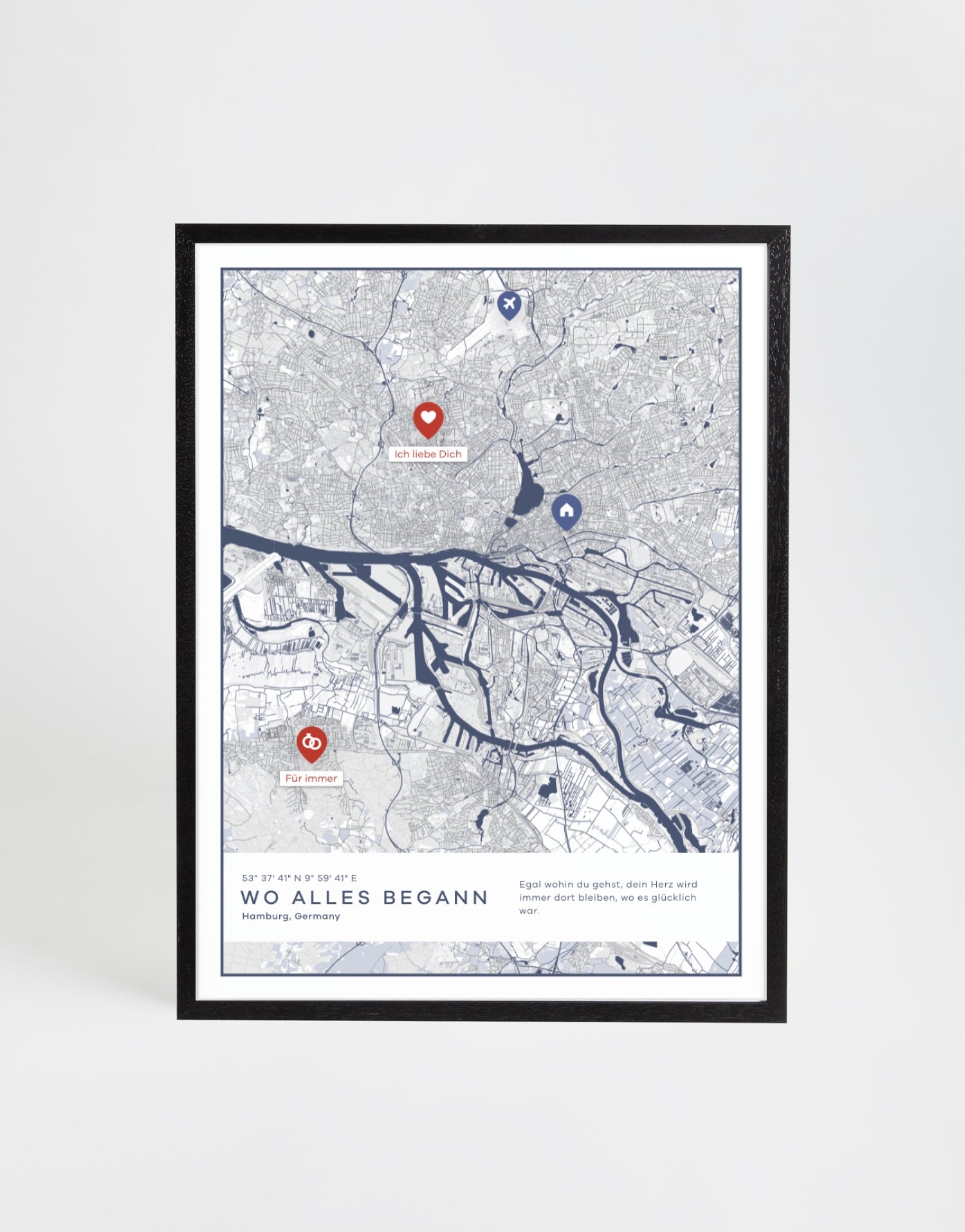 Personalisierte Stadtkarte mit mehreren Symbol-Markierungen, dem Schriftzug „Wo alles begann“ und einem frei wählbaren Zitat – gestaltet als hochwertiges Wandbild im schwarzen Rahmen.